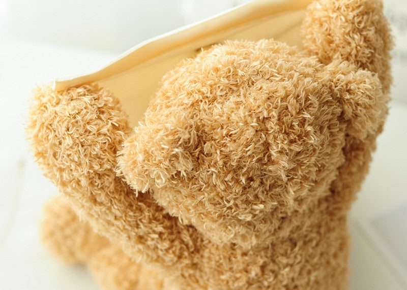 Osito Boo™ Peluche que juega a las escondidas